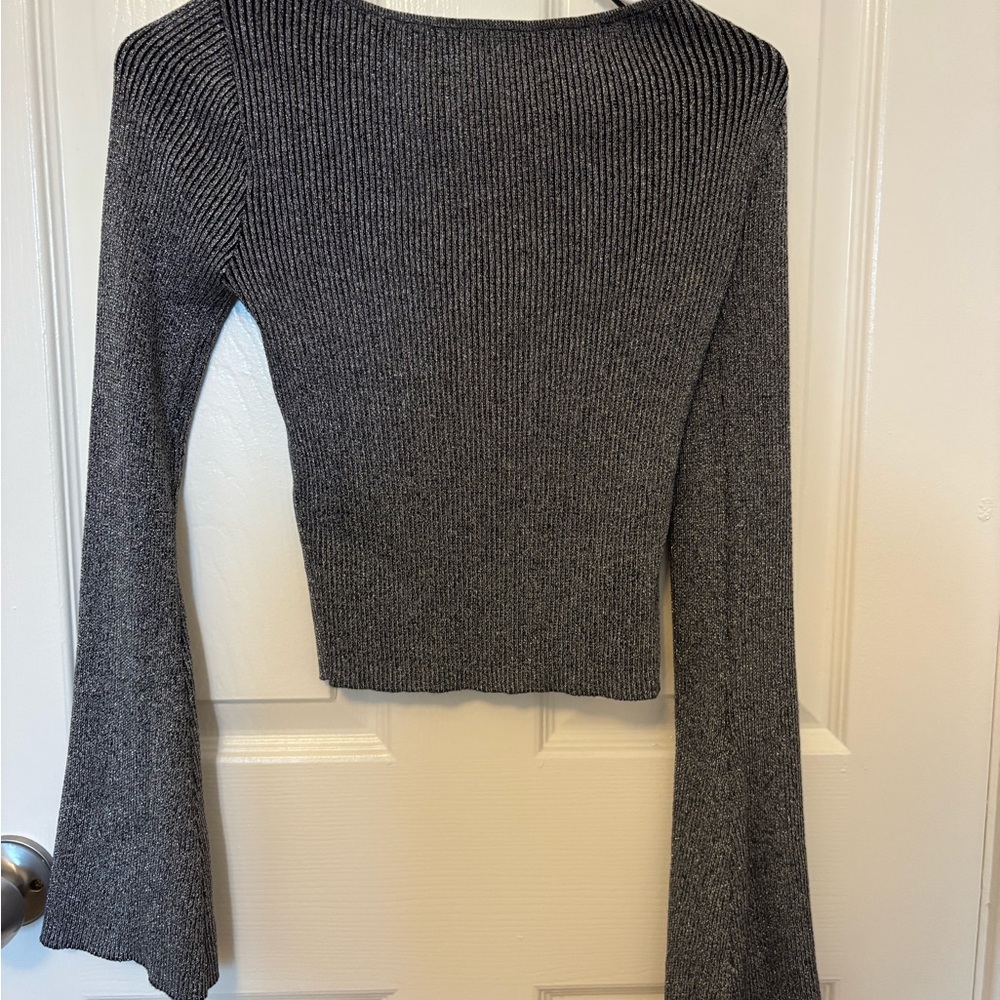 Metallic silver and black knit top